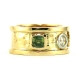 Side view with green sapphire bezel set